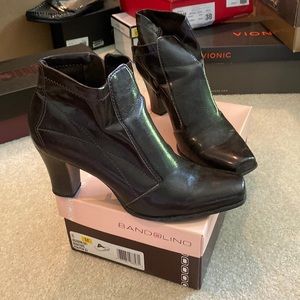 Bandolier heeled boots